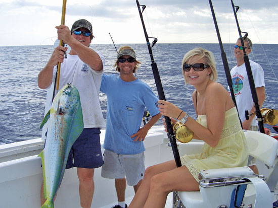The smiles and fishing memories shared during an offshore fishing charter can last a lifetime. Photography by Jeff Dennis