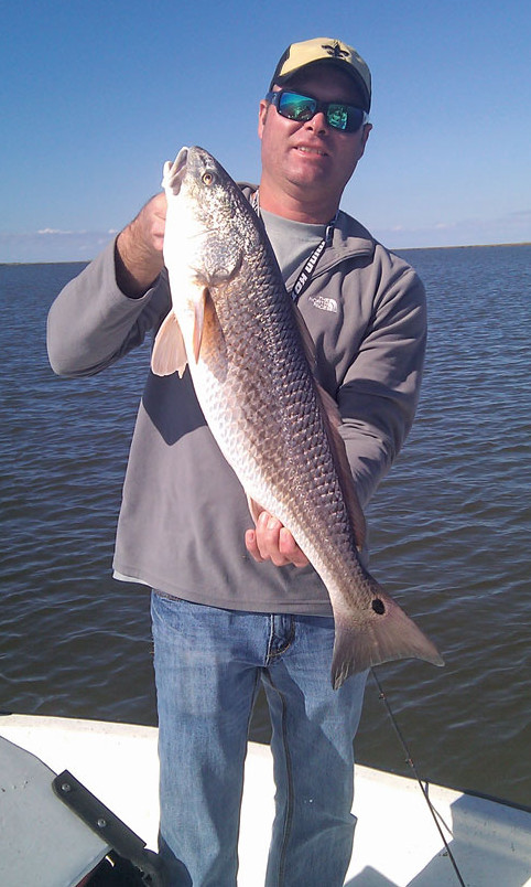 Capt. Mike Adams shows some recent catches from the near shore Gulf waters. Photo courtesy of Fort Bayou Charters