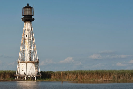 The 1881 South Pass lighthouse overlooks the site of the new Port Eads Marina. PHOTO: Rush Jagoe  /  www.louisianaseafoodnews.com